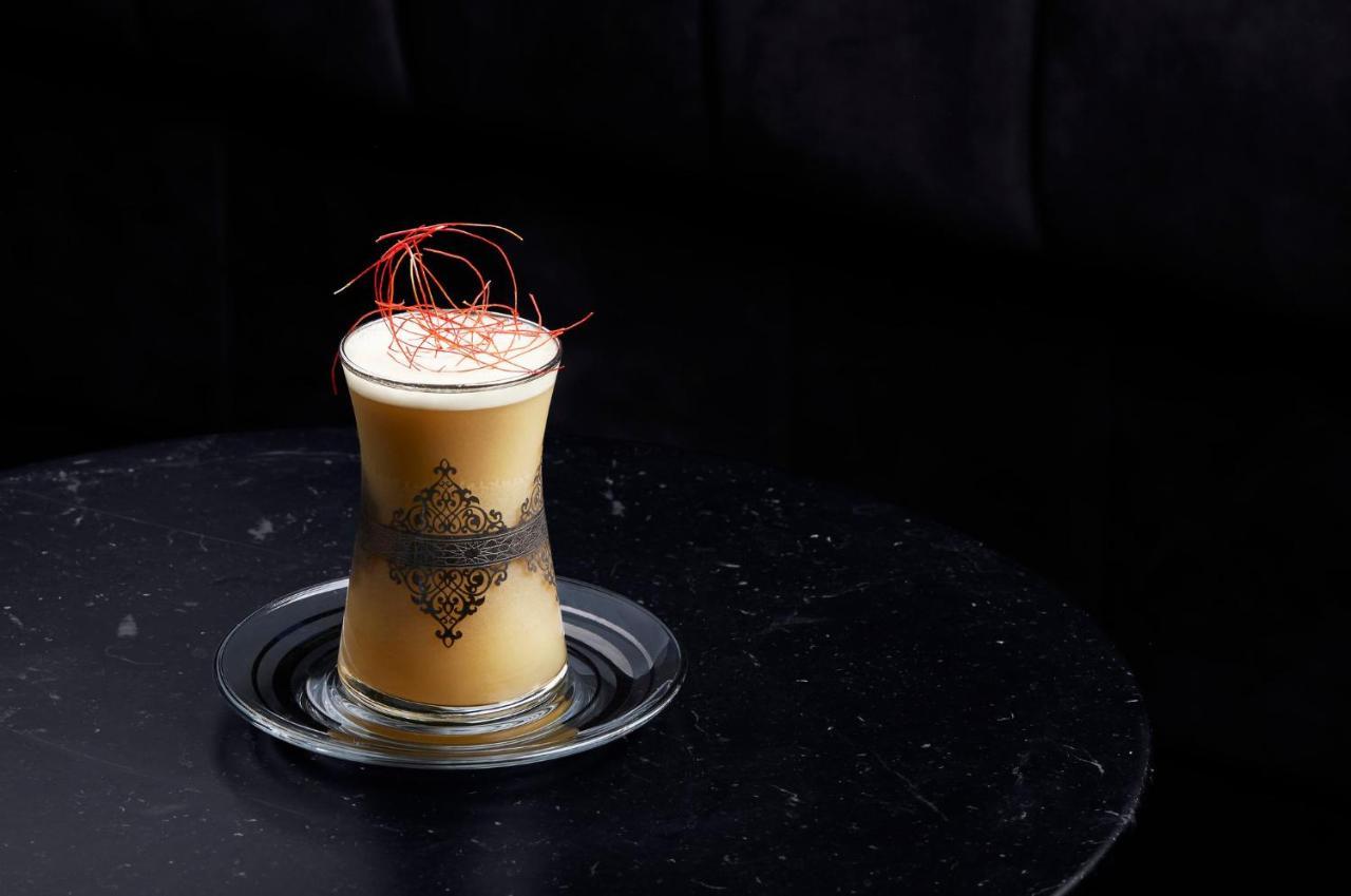 Abesq Doha Hotel And Residences, An Ihg Hotel Esterno foto A glass of eggnog