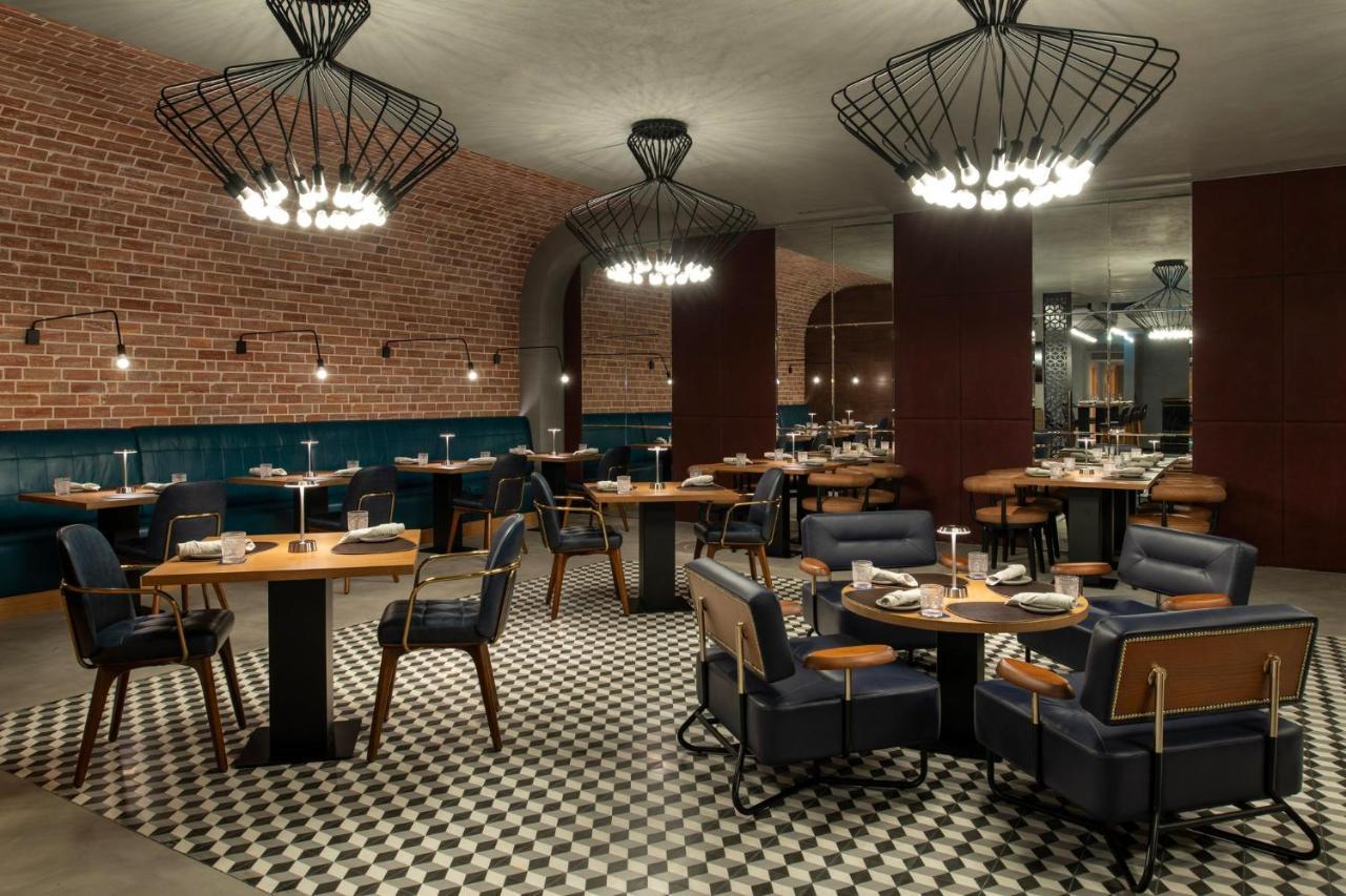 Abesq Doha Hotel And Residences, An Ihg Hotel Esterno foto The interior of the restaurant